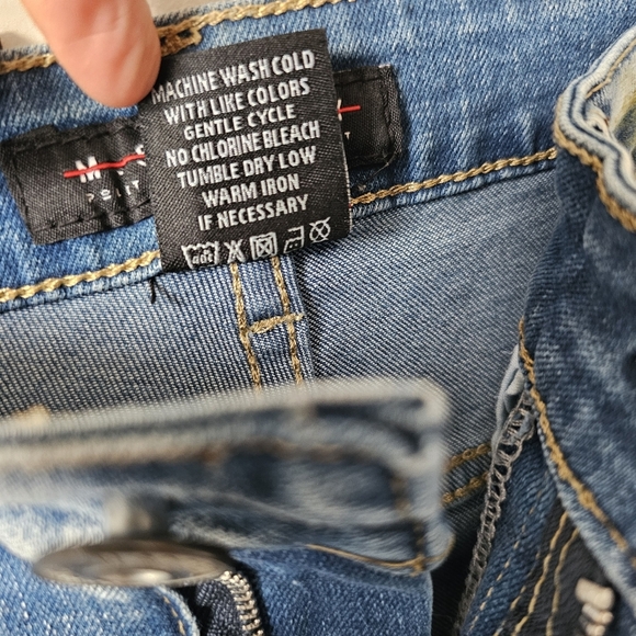 Skinny Fit Distressed Blue Denim Shorts with Stretch - Picture 11 of 15